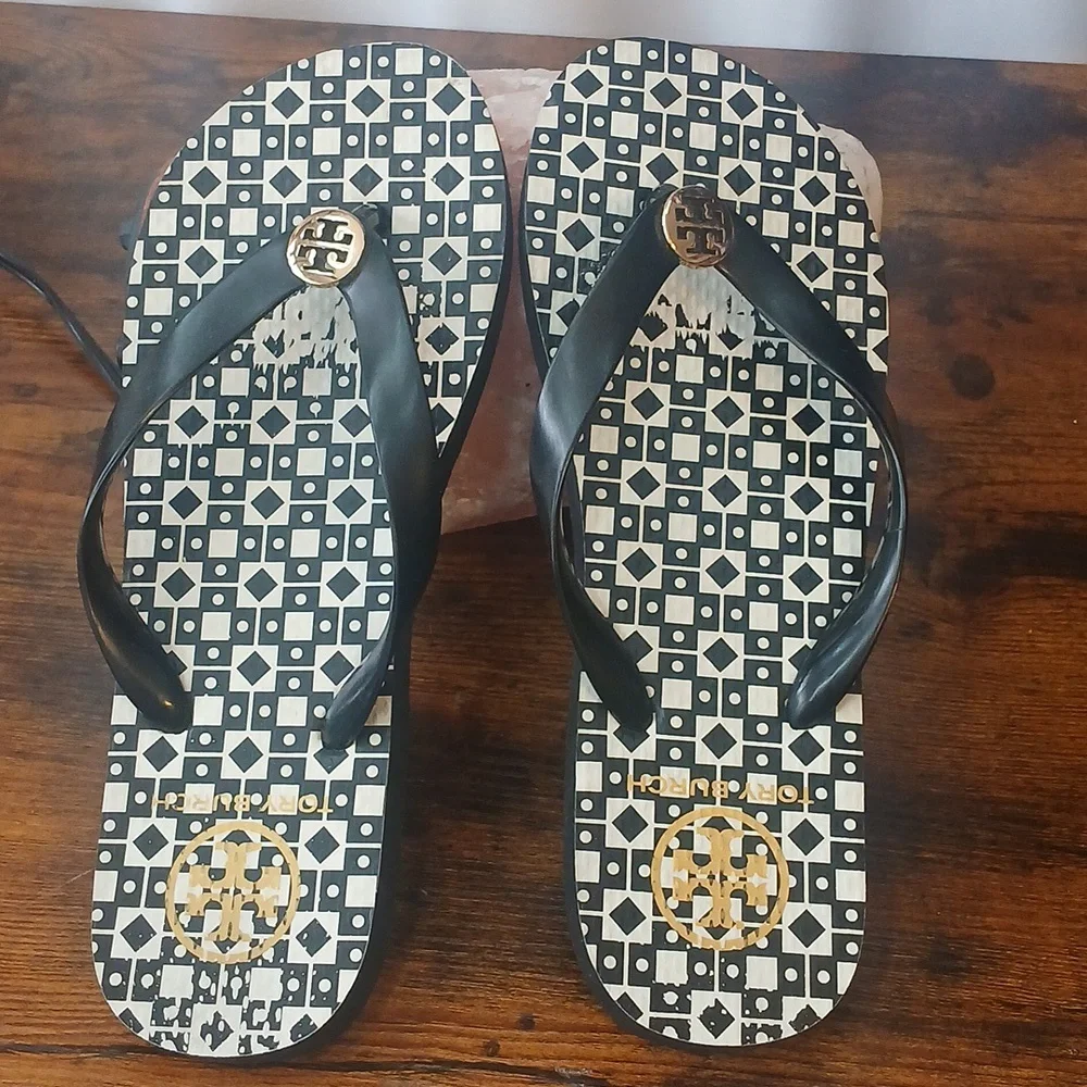 Tory Burch Black and White Logo Flip Flop Sandals with Gold Emblem